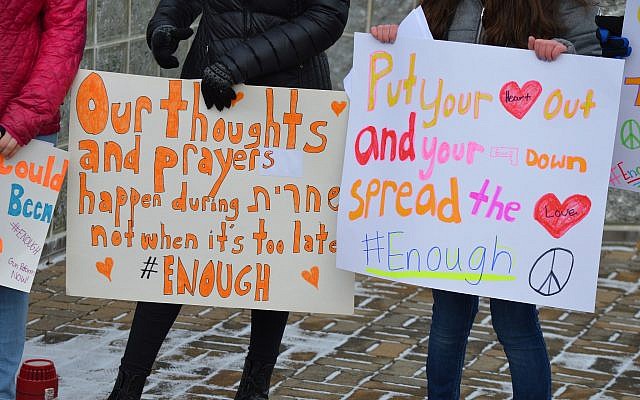 Signs from students at Community Day School as part of the National Walkout. (Photo courtesy of Community Day School)