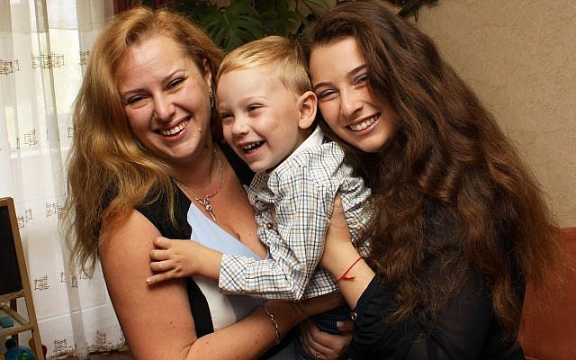 Anna Grigolaya, left, with her son and daughter. (Photo courtesy of Anna Grigolaya)