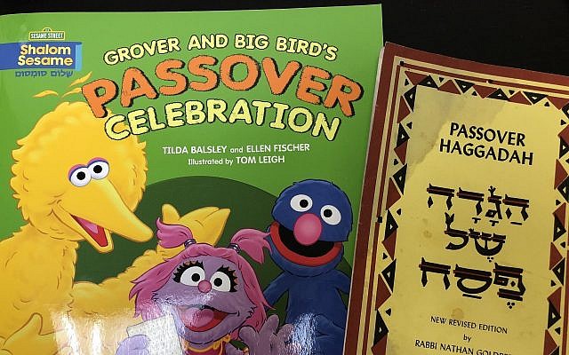 Some Passover books used by staff of the Chronicle. (Photo by Lauren Rosenblatt)