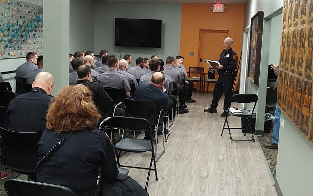 Officer David Shifren leads a discussion with recruits. (Photo by Adam Reinherz)