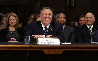 Mike Pompeo smiles at a moment of levity at a confirmation hearing before the Senate Intelligence Committee. (Photo by Joe Raedle/Getty Images)