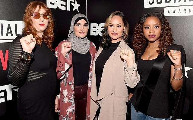 The organizers of the Women's March pose for a photo in Atlanta at BET's Social Awards: Bob Bland, Linda Sarsour, Carmen Perez and Tamika Mallory. Guest columnist Saul Golubcow argues that the movement is now associated with people who promote anti-Semitic rhetoric. (Photo by Paras Griffin / Getty Images for BET)