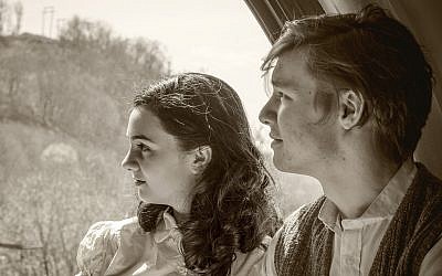 In the show, which runs through May 13 at the New Hazlett Theater, Anne Frank is played by Madeline Dalesio. Actor Somerset Young plays Peter van Daan. (Photo by Laura Slovesko)