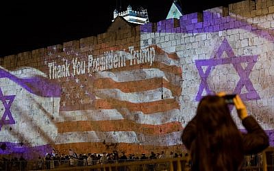 The Israeli and the American flags are screened on the walls of Jerusalem's Old City on May 13, 2018, ahead of the opening of the U.S. embassy in Jerusalem. (Photo by Yontan Sindel/Flash90)