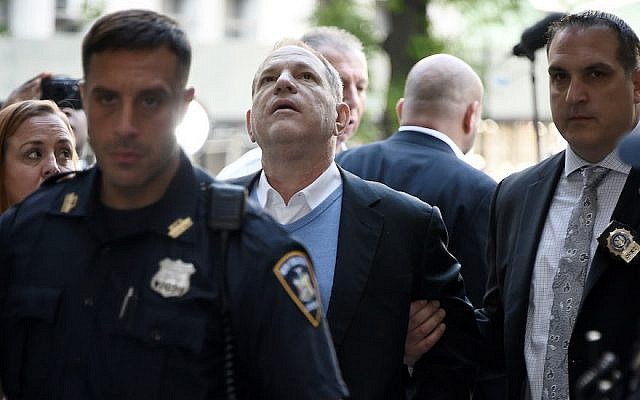 Harvey Weinstein arrives for his arraignment at a New York City courthouse in handcuffs, May 25, 2018. (Photo by Steven Ferdman/Getty Images)