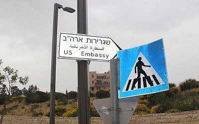 A newly hung sign pointing to the U.S. Embassy in Jerusalem, which was inaugurated on May 14, 2018. (Photo by Ben Sales)