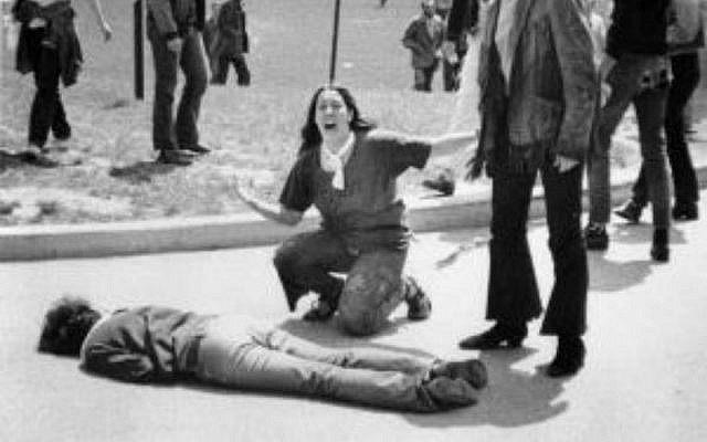 John Filo’s Pulitzer Prize-winning photograph of Mary Ann Vecchio, a 14-year-old runaway, kneeling over the body of Jeffrey Miller minutes after he was fatally shot by the Ohio National Guard at Kent State University, May 4, 1970.