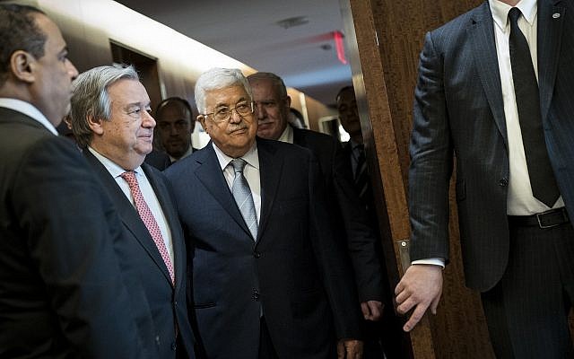 Palestinian Authority President Mahmoud Abbas, center, next to Secretary-General of the United Nations Antonio Guterres, second from left, arrives at a meeting at U.N. headquarters in New York. (Photo by Drew Angerer/Getty Images)
