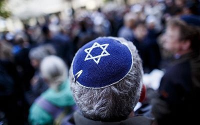 A man wears a kippah at a gathering in Berlin to protest anti-Semitism. (Photo by Carsten Koall/Getty Images)