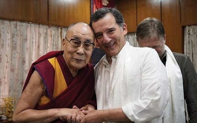 The author with the Dalai Lama: Hands across faiths. (Photo courtesy of the Office of the Dalai Lama)