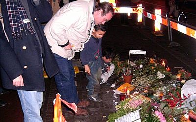 Visitors view a memorial for the slain Theo van Gogh in Amsterdam. (Photo courtesy of Wikimedia Commons)