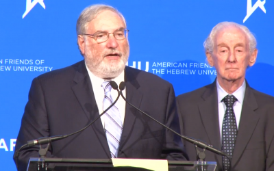 Meyer Koplow, left, accepts an award from the American Friends of The Hebrew University in 2016. (Photo screenshot from YouTube)