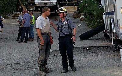 Last summer, Alan Hausman and members of PA Strike Team 1 spent nine hours rescuing a woman trapped in a collapsed apartment building in Washington County. (Photo courtesy of Alan Hausman)