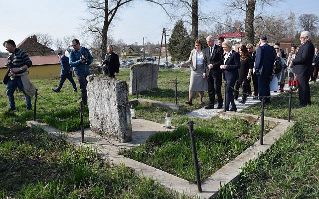 Photographers capture a ceremony at a Jewish cemetery in Frampol, Poland. (Photo by ESJF)