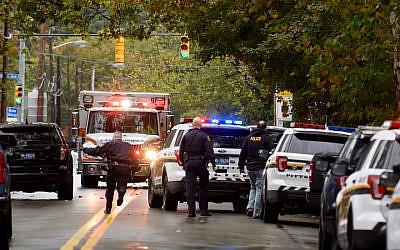Police respond to the site of a mass shooting at the Tree of Life Synagogue in the Squirrel Hill neighborhood of Pittsburgh, Oct. 27, 2018. (Photo by Jeff Swensen/Getty Images)
