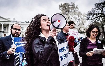 Activist Michele Freed, center, and other young professionals protest with HIAS in front of the White House in 2017. (Photo by Katie Jett Walls)