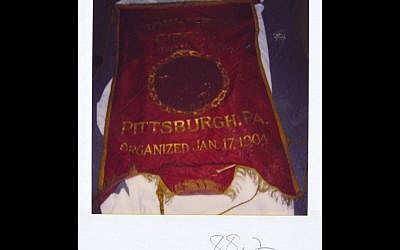 A photograph of the first artifact donated to what is now the Rauh Jewish History Program & Archives, taken at the time of donation in 1988. (Photograph courtesy Rauh Jewish History Program & Archive)