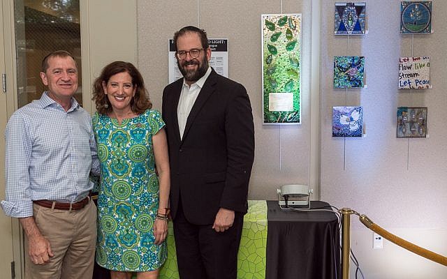 Dave Kalla, right, traveled to Austin, Texas, to represent the three congregations targeted on Oct. 27. Kalla is joined by Susan Ribnick and Rabbi Neil F. Blumofe, of Congregation Agudas Achim in Austin. 

Photo courtesy of Dave Kalla