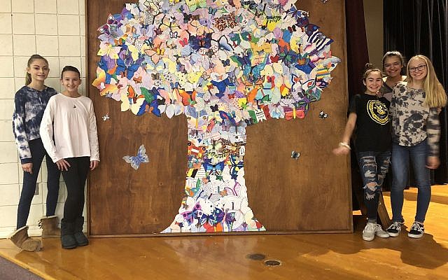 Students from the Harrison Middle School created an 8-by-8-foot manufactured tree with more than 140 butterflies. Photo courtesy of Daniel Shaner