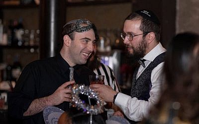 Aaron Weiss and Rabbi Henoch Rosenfeld celebrating Purim at CAVO in the Strip District. (Photo provided by Henoch Rosenfeld)