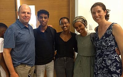 Brian Eglash, left, and Kim Salzman, far right, met with recipients of a medial arts scholarship for Ethiopian Israeli students, made possible by a recent anonymous donation to the Jewish Federation of Greater Pittsburgh. Photo courtesy of Kim Salzman