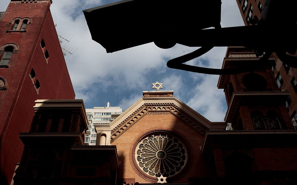 A security camera hangs across the street from the Park East Synagogue in New York City. Photo by Drew Angerer/Getty Images via JTA