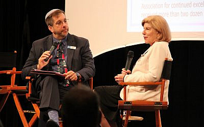 Rabbi Ron Symons listens as National Public Radio legal affairs correspondent Nina Totenberg discusses her reporting on the Supreme Court. 

Photo courtesy of Jewish Community Center of Greater Pittsburgh