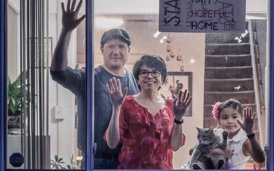 The Dancisin family photographed in their home for the photo series Isolated Radiance. Photo by Elan Mizrahi