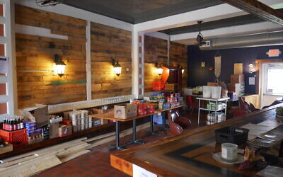 Scratch Food & Beverage has converted into a pay-what-you-can restaurant complete with a small market of household needs. Photo courtesy of Don Mahaney.