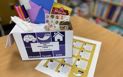 Rodef Shalom Congregation's at home kit includes candles, honey, greeting card supplies, a challah cover, baking supplies, dissolvable paper, book lists, prayer cards and more. Photo by Yael Eads