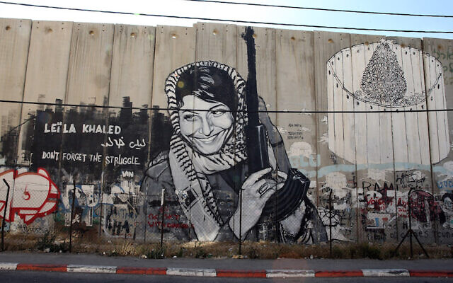 A mural of Leila Khaled in the West Bank, June 16, 2013. (Ian Walton/Getty Images via JTA) A mural of Leila Khaled in the West Bank, June 16, 2013. (Ian Walton/Getty Images via JTA)