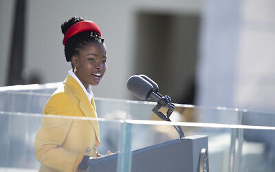Amanda Gorman recites her inaugural poem, "The Hill We Climb," during the 59th Presidential Inauguration ceremony in Washington, Jan. 20, 2021. President Joe Biden and Vice President Kamala Harris took the oath of office on the West Front of the U.S. Capitol. (DOD Photo by Navy Petty Officer 1st Class Carlos M. Vazquez II)