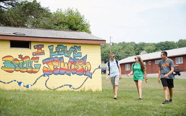 Campers and staff walk together at Camp Harlam in Kunkletown, PA. Photo courtesy of Camp Harlam Campers and staff walk together at Camp Harlam in Kunkletown, PA. Photo courtesy of Camp Harlam