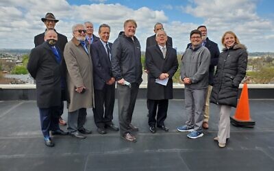 Elected officials and community members marked Earth Day 2021 by dedicating new solar panels at Beth Shalom. Photo by Adam Reinherz