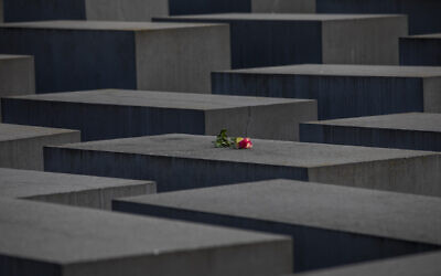 A rose is placed on the Holocaust Memorial on the International Holocaust Remembrance Day on January 27, 2021 in Berlin, Germany. (Photo by Maja Hitij/Getty Images via JTA)