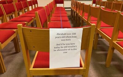 Synagogues regulations vary for members wishing to worship in person. Temple David in Monroeville has readied their congregation with signs in the sanctuary, post-COVID-19.  Photo by Barbara Fisher.
