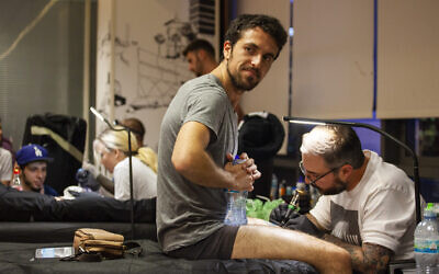 Healing Ink, a project of Artists 4 Israel, provides free tattoos to those injured in terrorist and antisemitic attacks. Photo by  Dillon Meyer