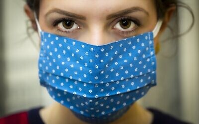 Despite masks and vaccines, some who contract COVID-19 experience symptoms months after shedding the virus. (Image by Christo Anestev/Pixabay)