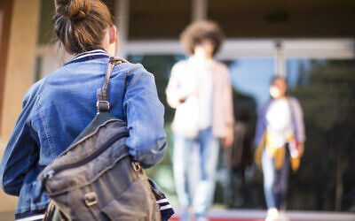 Student walks to school. Photo by seb_ra via iStock