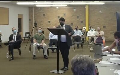 Rabbi Eric “Yitz” Frank addresses the City Council of University Heights, Ohio, on Sept. 9, 2021, saying women and children were traumatized by the presence of an unmarked SUV outside a local Orthodox synagogue on the first day of Rosh Hashanah. (Screenshot via Cleveland Jewish News)