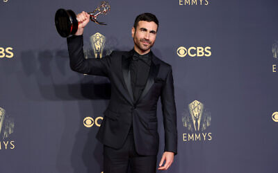 Brett Goldstein, winner of best supporting actor in a comedy series for “Ted Lasso,” poses in the press room during the 2021 Emmy Awards, Sept. 19, 2021. (Photo by Rich Fury/Getty Images via JTA)