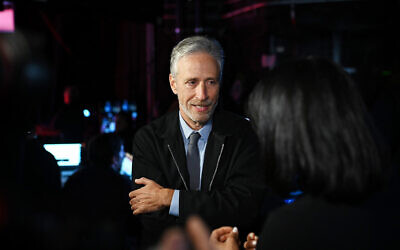 Jon Stewart speaks backstage during the 13th annual Stand Up for Heroes to benefit the Bob Woodruff Foundation at The Hulu Theater at Madison Square Garden on Nov. 4, 2019 in New York City. (Photo by Bryan Bedder/Getty Images for The Bob Woodruff Foundation via JTA )