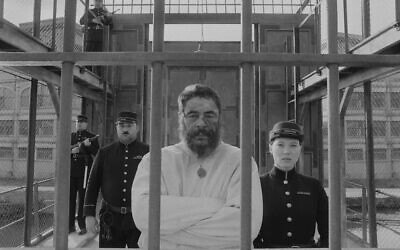 Benicio del Toro, center, as Moses Rosenthaler, and Lea Seydoux, right, as Simone in "The French Dispatch." (Searchlight Pictures via JTA)