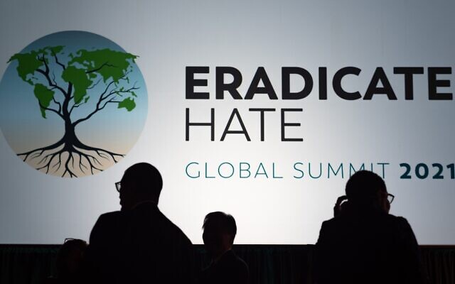 Attendees of the Eradicate Hate Global Summit 2021 chat at the end of the day’s sessions on Oct. 18, 2021, at the David L. Lawrence Convention Center in downtown Pittsburgh. (Photo by Lindsay Dill)