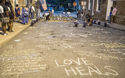 A memorial for Heather Heyer who was killed. On Aug. 12, 2017, a car was deliberately driven into a crowd of people who had been peacefully protesting the Unite the Right rally in Charlottesville, Virginia, killing one and injuring 28. (Getty Images)