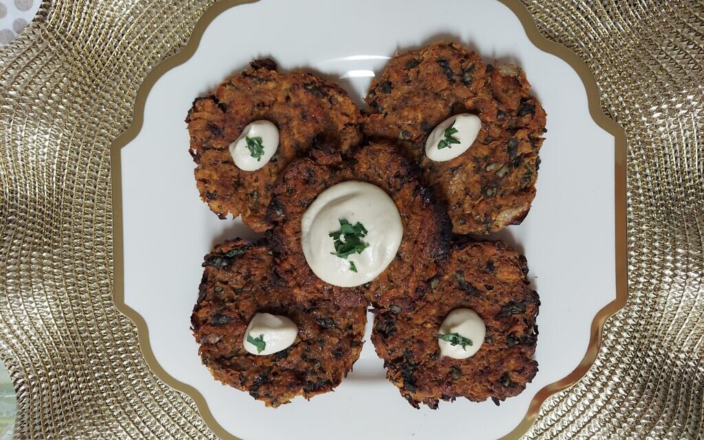 Baked sweet potato and spinach latkes with vegan sour cream (Photo by Ilana Meiller)