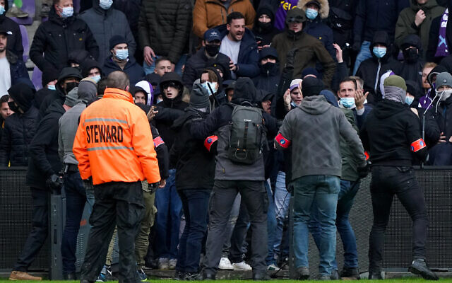 Soccer fans scuffle during a match between the Beerschot team and Royal Antwerp FC at Olympisch Stadion in Antwerp, Belgium, Dec. 5, 2021. (Orange Pictures)