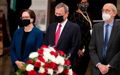 United States Supreme Court Chief Justice John Roberts (center), Supreme Court Associate Justice Elena Kagan (left) and Supreme Court Associate Justice Stephen Breyer (right) pay their respects before the casket of former Republican Senator from Kansas Bob Dole as he lies in state following a ceremony in the Rotunda of the US Capitol, Dec. 9, 2021. Breyer is reported ready to retire, which would leave Kagan the sole Jewish justice on the court. (Michael Reynolds-Pool/Getty Images)