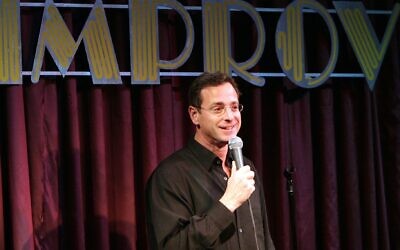 Comedian Bob Saget performs at the Improv Comedy Club at the Seminole Hard Rock Hotel and Casino in Hollywood, Fla., Feb. 24, 2006. (Ralph Notaro/Getty Images)
