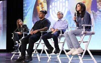 A panel at the BBYO convention in Baltimore included, from left, Eve Barlow, a freelance music journalist; Zach Banner of the Pittsburgh Steelers; Josh Kraft, the resident of Kraft Family Philanthropies and Jadyn Davidson (R), the regional president from BBYO Keystone Mountain Region, Feb. 18, 2022. (Jason Dixson Photography)